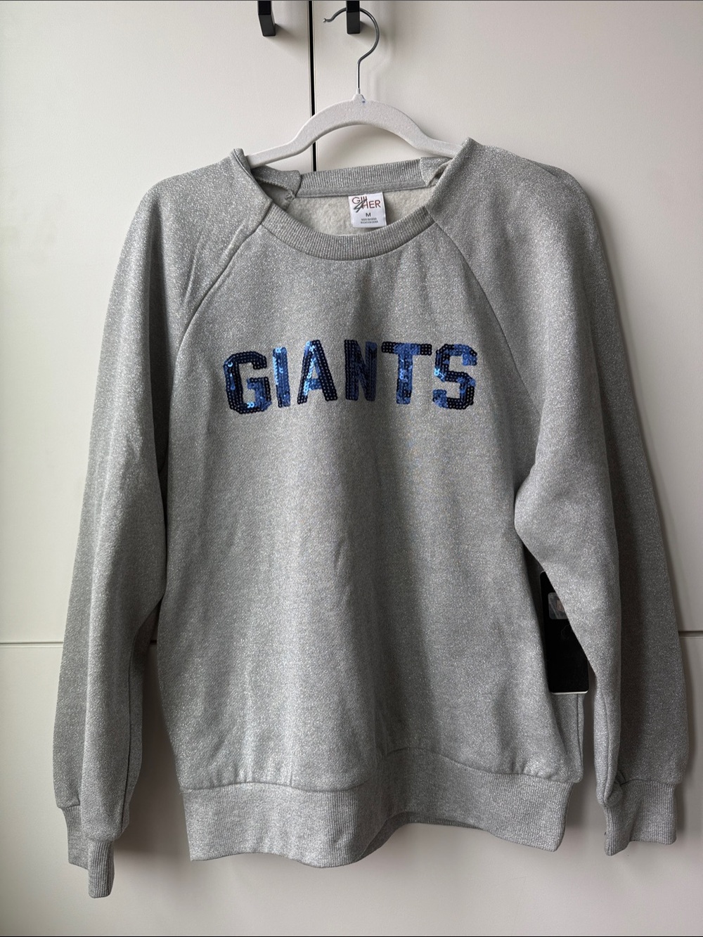 NFL Silver Women's Pullover with Blue sequence giants logo.